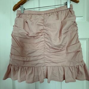 Chic Ruffled Mini Skirt in Soft Pink
